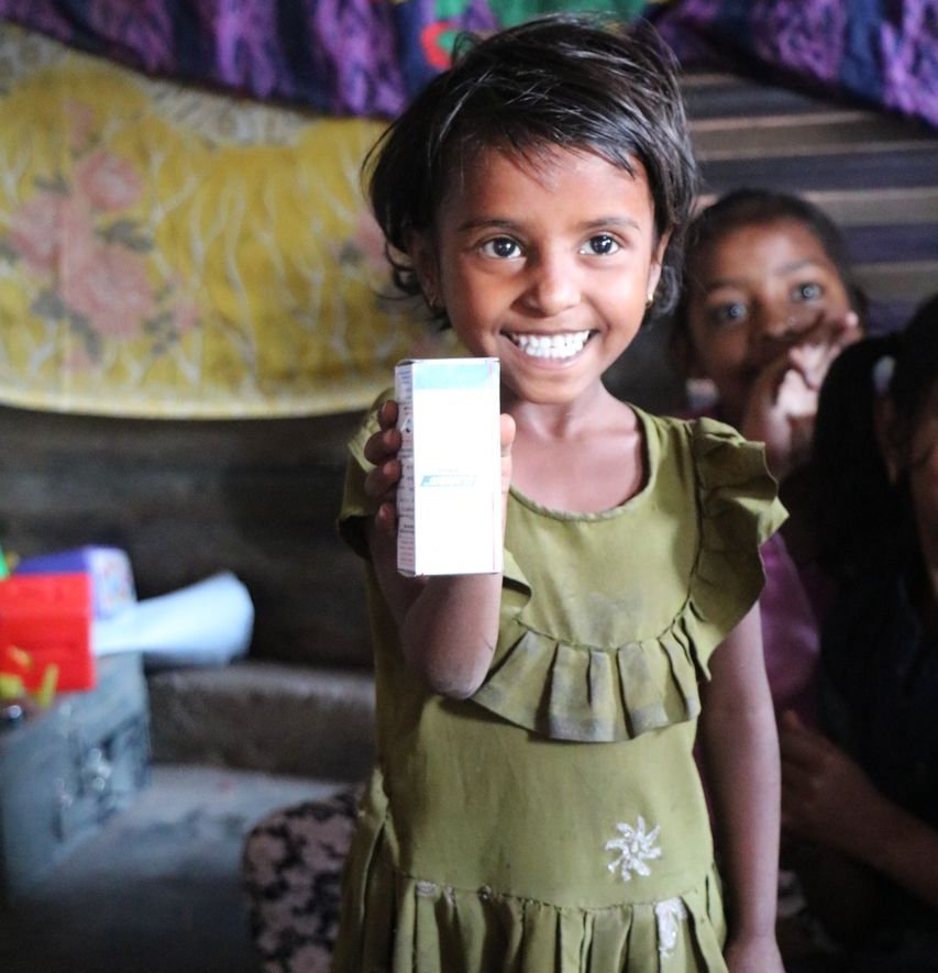 Indien: Glückliche Patientin der mobilen Klinik