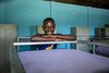 Haiti: Junge im Schlafraum